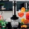 A blender is shown on a countertop with drinks and fruit, suggesting its use in preparing beverages. Anteprima dell’immagine prodotto