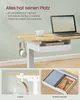 A desk with a laptop, headphones, and a drawer, with close-up shots of the headphone hook and drawer. Produktbild-Vorschau