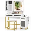 A white vanity set with gold accents, including a mirror with LED lights, drawers, a jewelry cabinet, a stool, and a side cabinet with a hairdryer. Podgląd zdjęcia produktu