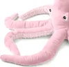 A close-up view of a pink plush octopus toy. Náhľad obrázku produktu