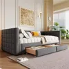 A bedroom or living room setting with a daybed and pull-out trundle. Náhled obrázku produktu