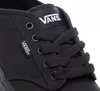A close-up view of the front of a black Vans shoe, focusing on the laces and branding. Voir les images du produit