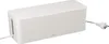 A white cable management box with a power cord plugged into it. Náhľad obrázku produktu