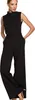 A woman wearing a black jumpsuit. Podgląd zdjęcia produktu