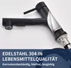 A black kitchen faucet is shown with a cutaway view revealing its internal layers, set against a white background. Text overlays describe its features. Produktbild-Vorschau