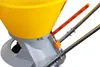 Close-up view of a fertilizer spreader's hopper and handles. Náhled obrázku produktu
