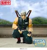 A figure of Tengen Uzui from Demon Slayer is posed in a crouching position on a sandy surface with a blurred background of a traditional Japanese-style building and greenery. Náhľad obrázku produktu