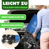 A woman is loading a blue foldable trolley into the trunk of a car. The image has overlaid text highlighting features. Produktbild-Vorschau