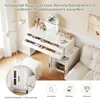 A white vanity table with drawers and a mirror, next to a bed and a floor lamp. A small cabinet is shown in a circular inset. Voir les images du produit