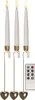 Three LED taper candles with gold heart-shaped holders and a remote control, displayed against a white background. Podgląd zdjęcia produktu