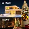 A split image showing outdoor and indoor Christmas light decorations. The top half shows a house decorated with lights and a Christmas tree outside. The bottom half shows a fireplace and a Christmas tree decorated with lights inside a home. Náhled obrázku produktu