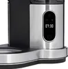 A close-up view of the digital display and control panel of a coffee maker. Voir les images du produit