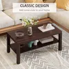A coffee table with decorative items on it, placed in a living room setting. Produktbild-Vorschau