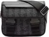 A black Lacoste messenger bag with a geometric pattern. Anteprima dell’immagine prodotto