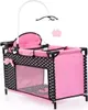 A doll's crib with a mobile and accessories. Anteprima dell’immagine prodotto
