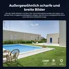 A modern outdoor space with a swimming pool, lounge chairs, and a building. Produktbild-Vorschau