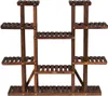 A wooden plant stand with multiple shelves against a white background. Produktbild-Vorschau