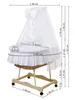 A white baby bassinet with a wooden stand, featuring dimensions indicated by measurement lines and text. Produktbild-Vorschau