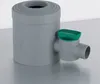 A gray cylindrical rain collector with a green cap on a gray surface. Anteprima dell’immagine prodotto