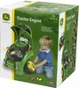 A child playing with a John Deere tractor engine toy on its packaging. Anteprima dell’immagine prodotto