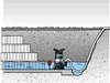 Diagram showing a submersible pump in a water-filled pit with stacked blocks and a drainage pipe. Podgląd zdjęcia produktu