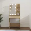 A makeup vanity with LED lights and shelves is shown against a plain wall. Voir les images du produit