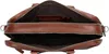 An open brown leather briefcase, viewed from above. Produktbild-Vorschau