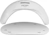 A white UV LED nail lamp with a detachable base. Anteprima dell’immagine prodotto