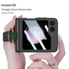 A person's hands are holding a black phone case with a ring and strap, showing the phone screen. Produktbild-Vorschau