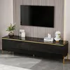 A black TV cabinet with gold accents is shown in a living room setting. Anteprima dell’immagine prodotto