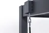 A close-up view of a metal chain and carabiner attached to a dark gray aluminum structure, likely part of a pergola or similar outdoor structure. Produktbild-Vorschau