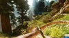 A first-person perspective of a player aiming a bow and arrow at a deer in a forest setting. Produktbild-Vorschau