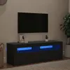 A modern living room with a TV mounted on the wall above a black TV stand with blue LED lighting. Anteprima dell’immagine prodotto