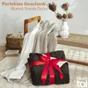 A cozy scene with blankets, a basket, and decorative elements, suggesting comfort and home decor. Náhľad obrázku produktu
