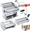 A collection of pasta making accessories, including a pasta machine, various attachments, and a box. Náhľad obrázku produktu