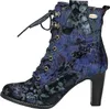 A single blue floral boot with a heel, shown from the side. Produktbild-Vorschau