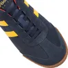 Close-up view of the toe area of a blue and yellow athletic shoe. Produktbild-Vorschau
