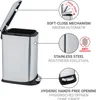 A stainless steel trash can with its lid open, showing various features highlighted with text and diagrams. Produktbild-Vorschau