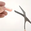 Nůžky na obočí z nerezové oceli s hřebenem, růžové Náhled obrázku produktu 3