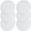 Six white round plastic lids are stacked in two columns of three. Produktbild-Vorschau