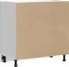 The back view of a white kitchen cabinet with a brown particleboard back panel, standing on black legs. Náhľad obrázku produktu