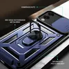 A close-up, angled view of a blue smartphone case with a built-in ring holder and camera cover. Produktbild-Vorschau