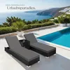 Two lounge chairs and a side table are set up on a patio next to a swimming pool with a scenic ocean view in the background. Náhled obrázku produktu