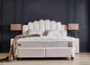 A bed with two nightstands in a bedroom setting. Produktbild-Vorschau
