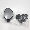 A bicycle mirror and its mounting hardware are shown in clear plastic packaging against a white background. Náhľad obrázku produktu
