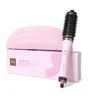 A pink box and a pink hair dryer brush are displayed against a white background. Produktbild-Vorschau