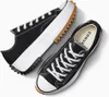 A pair of black Converse Run Star Hike shoes are shown from a top-down perspective against a white and light gray background. Podgląd zdjęcia produktu