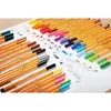 A collection of STABILO point 88 fineliner pens arranged on a white surface with a honeycomb-like pattern drawn on it. Produktbild-Vorschau