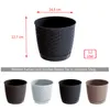 A black plant pot with dimensions and capacity indicated, along with other colored pots shown below. Produktbild-Vorschau