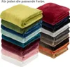 A stack of folded blankets in various colors, with text at the top. Produktbild-Vorschau